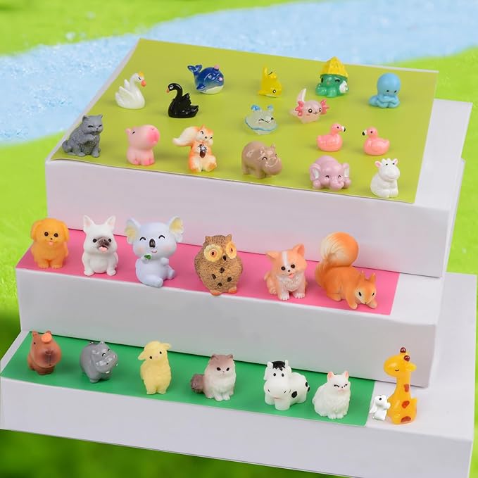 A group of mini figurines sitting on green underground.
