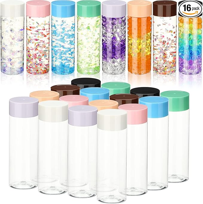 A group of empty and full transparent bottles, some filled with glitter.
