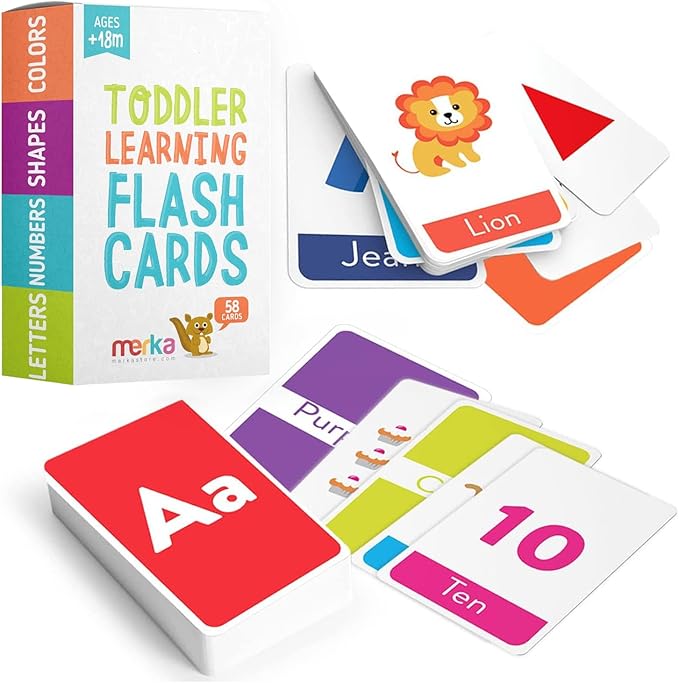 A couple of cards with prints of numbers, a lion and some letters.