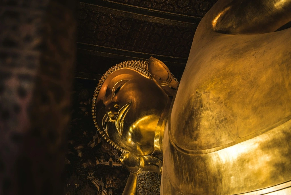 Big lying golden Buddha statue.