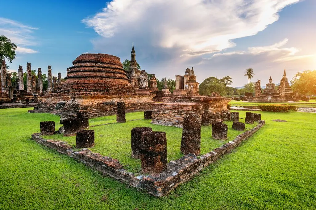 Temple ruins on green gras.