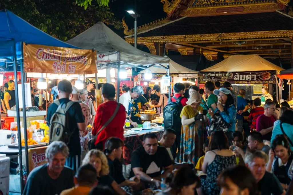 Ultimate 3-Day Chiang Mai Itinerary for First Timers 7 A group of people at a street market.