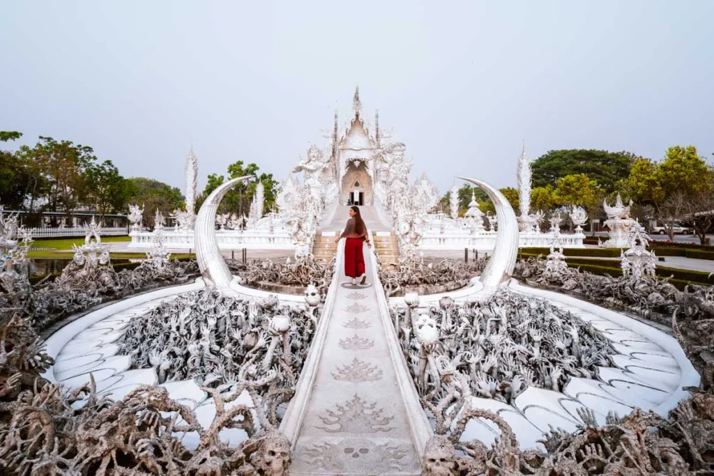 Ultimate 3-Day Chiang Mai Itinerary for First Timers 12 A woman standing in front of a white building.
