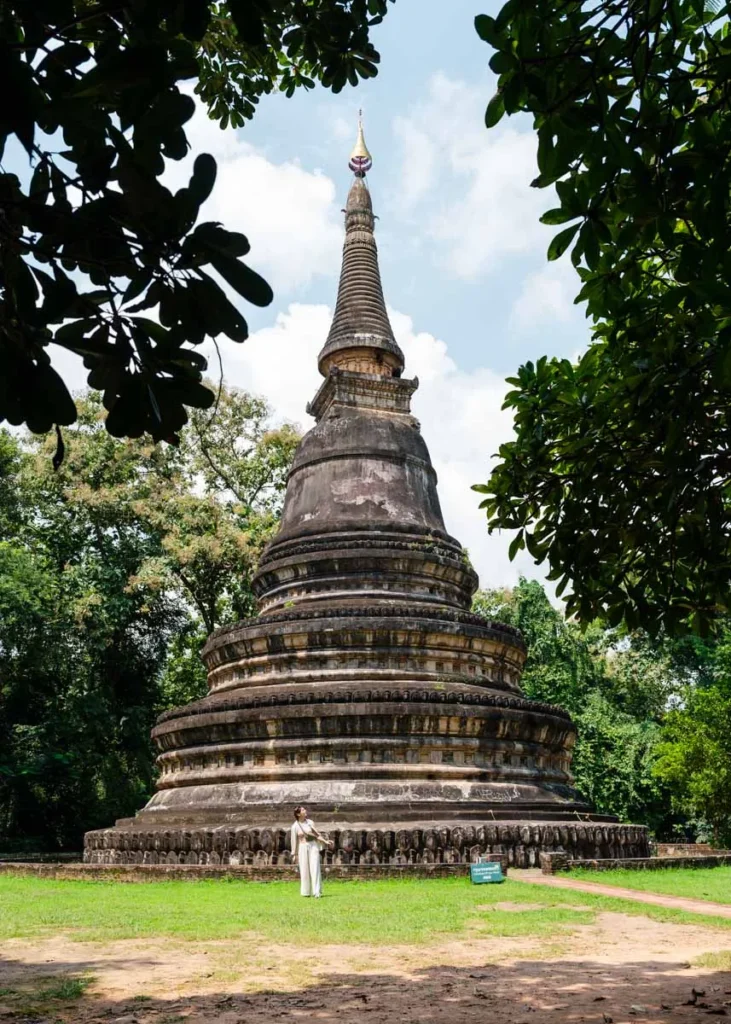 Ultimate 3-Day Chiang Mai Itinerary for First Timers 5 A person standing in front of a large stone tower.
