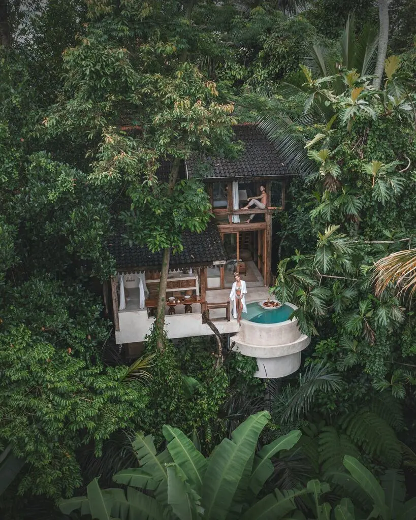 Bali Family Guide – Top 8 Things to do in Ubud with Kids 10 A house surrounded by trees.