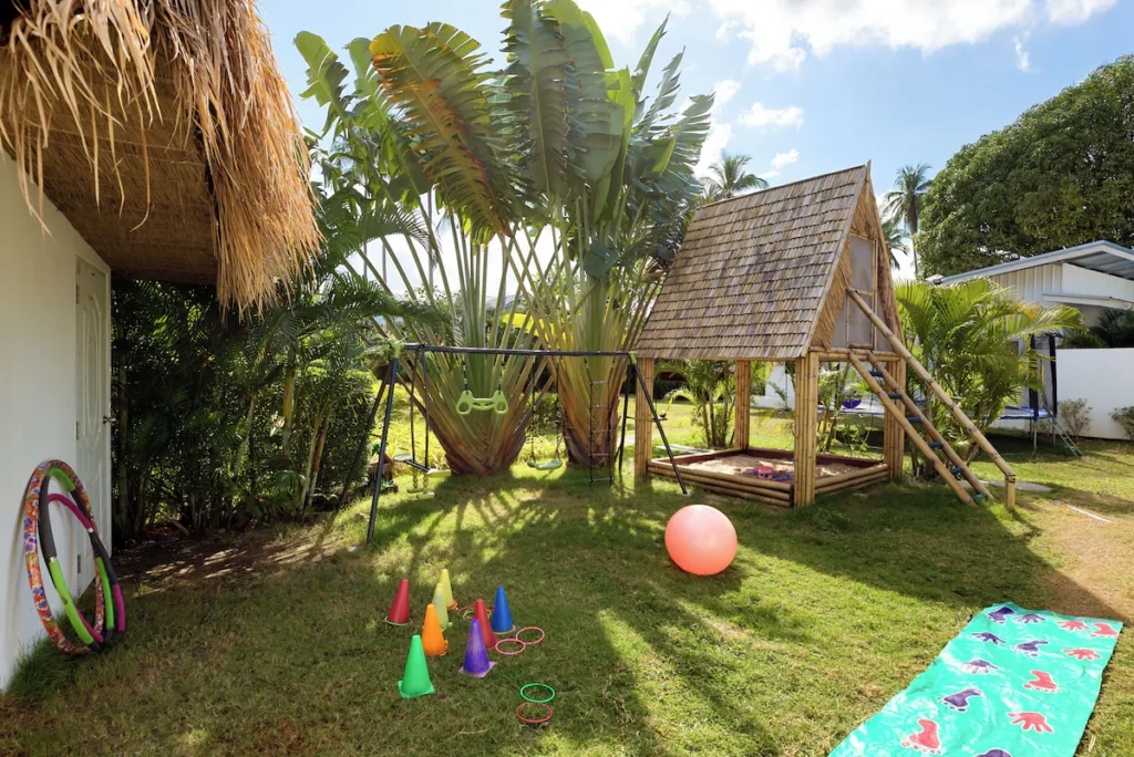 Garden with little tree house. Maya is one of the best family resorts in Koh Samui.