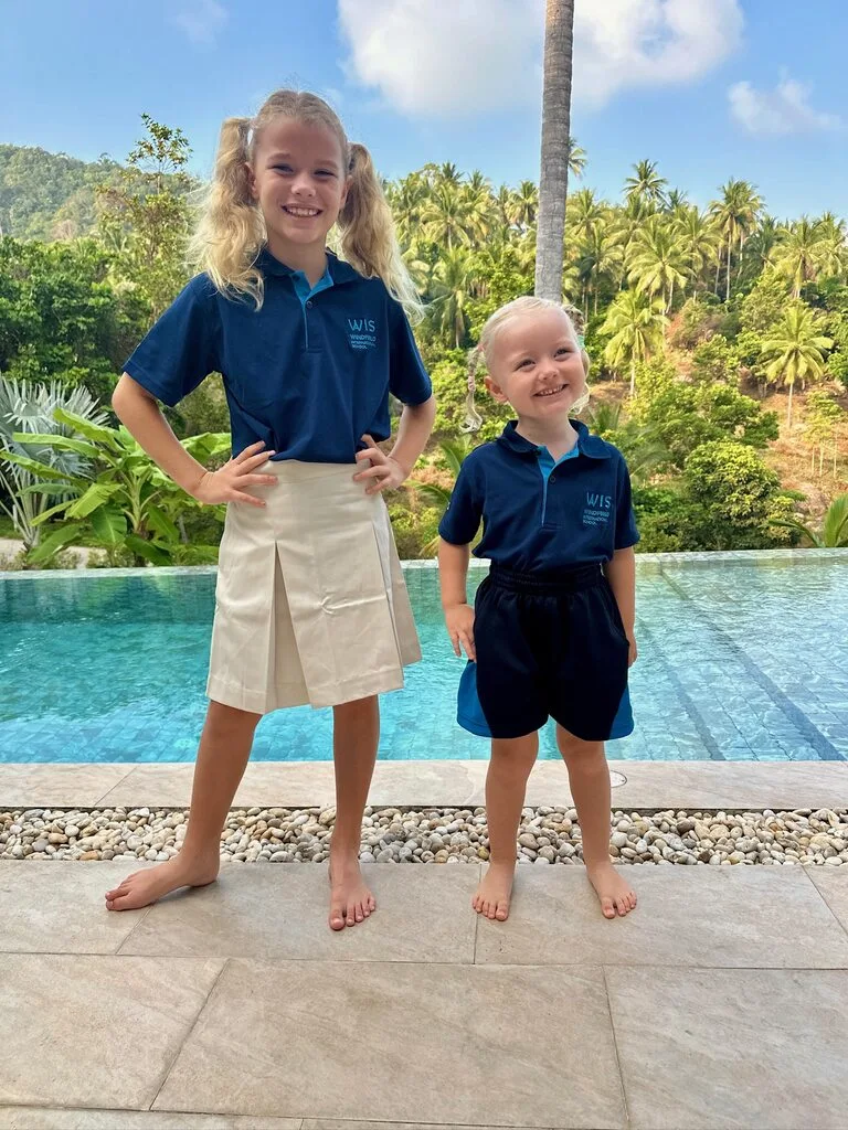 25 Fun & Interesting Thailand Facts Kids Will Love 9 Two girls standing next to a pool.