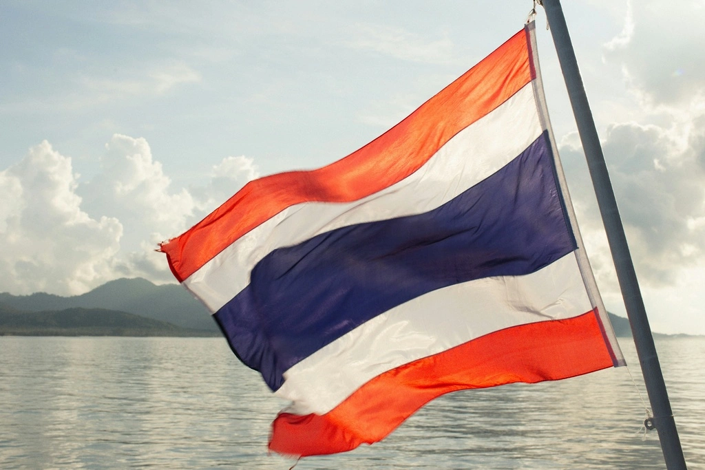 25 Fun & Interesting Thailand Facts Kids Will Love 14 A flag flying on a pole.
