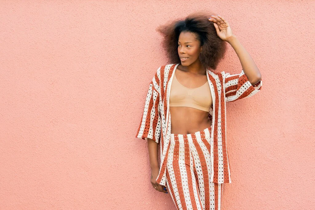 A woman posing for a picture.