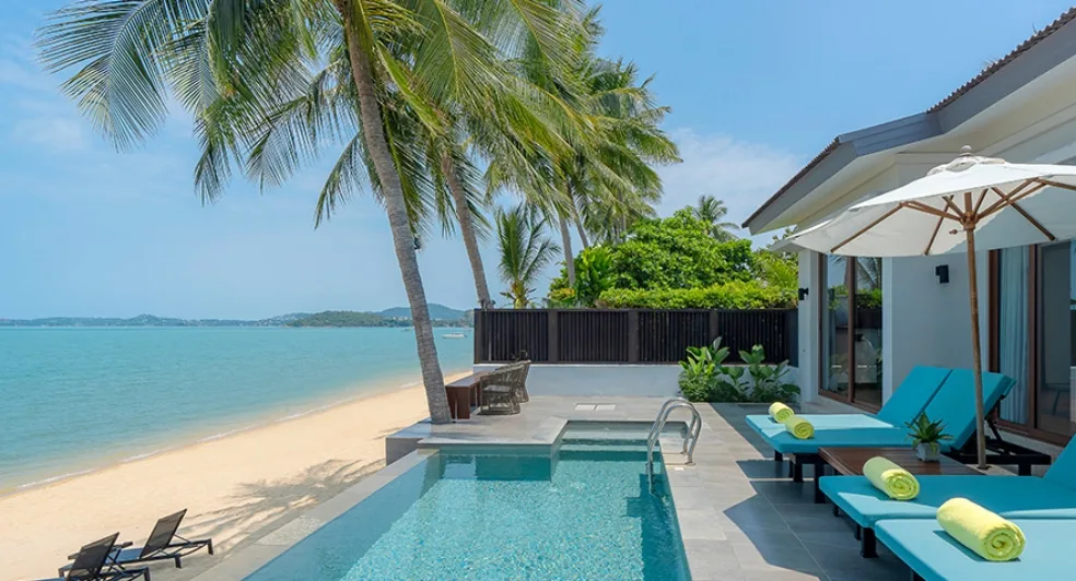 A swimming pool and a beach.