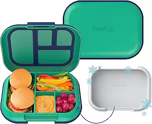 A green lunch box with food in it.