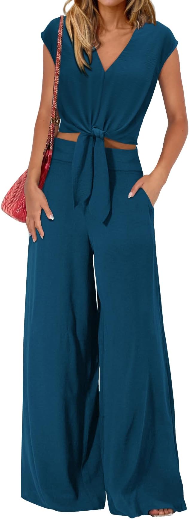 A woman wearing a blue pants.