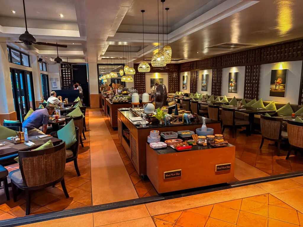 Anantara Bophut Koh Samui – Honest Family Review 2025 30 A restaurant with many tables and chairs.