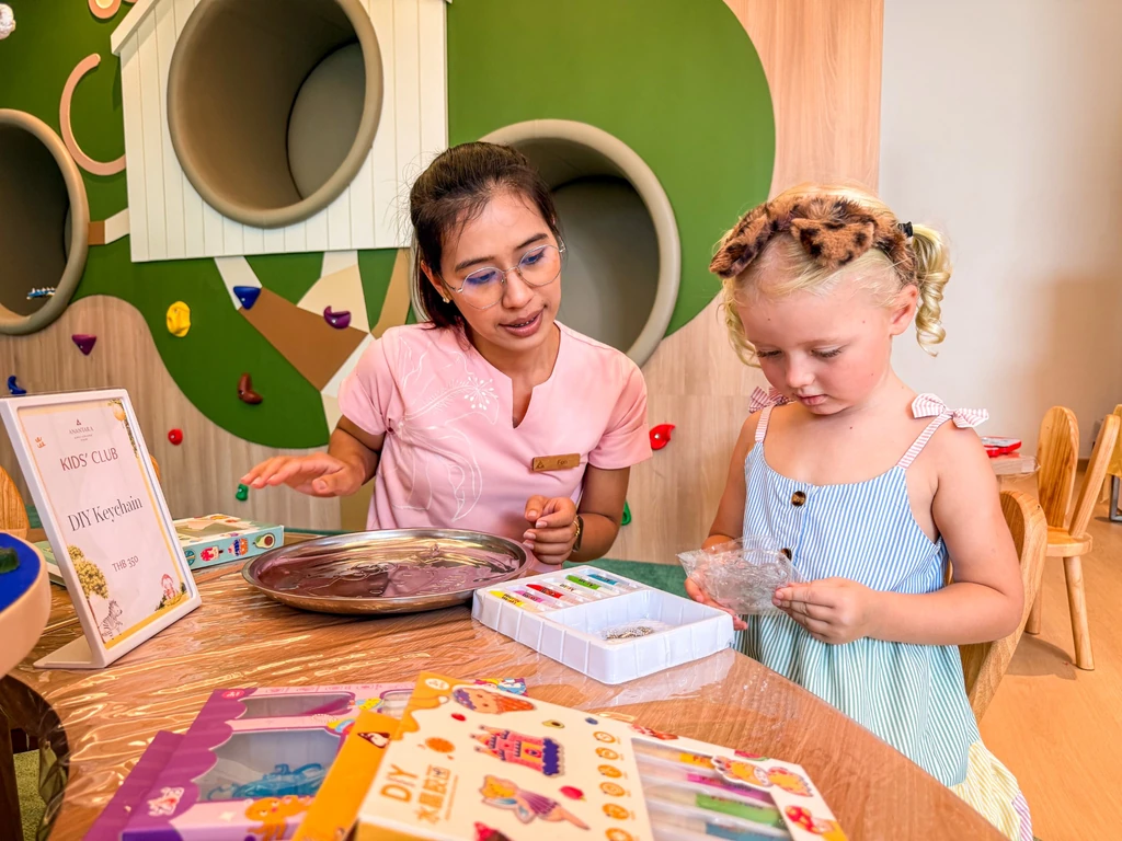 Anantara Bophut Koh Samui – Honest Family Review 2025 12 A woman and a girl playing with toys.