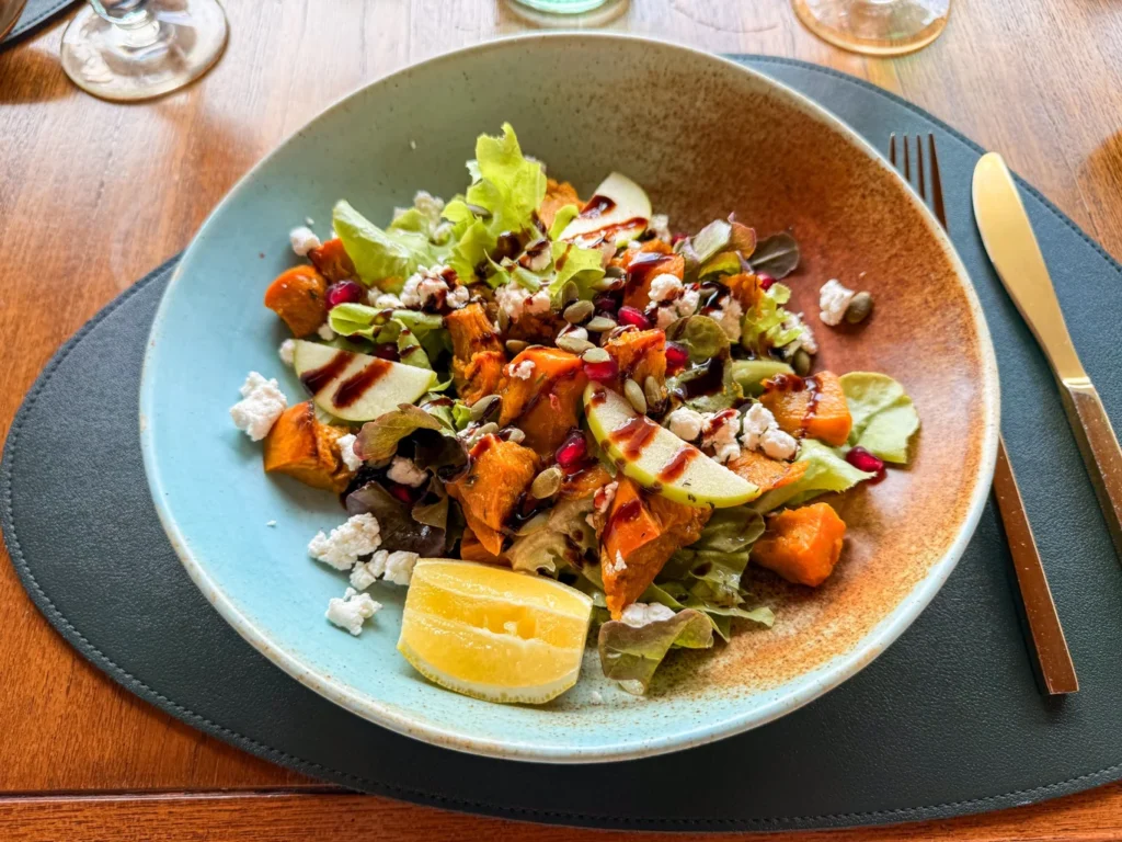 Anantara Bophut Koh Samui – Honest Family Review 2025 9 A plate of salad with fruit and vegetables.