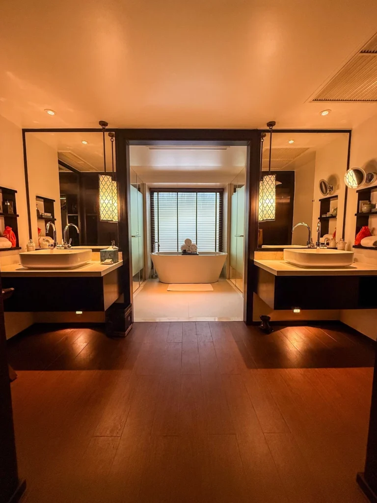 Anantara Bophut Koh Samui – Honest Family Review 2025 6 A bathroom with double sinks and a tub.