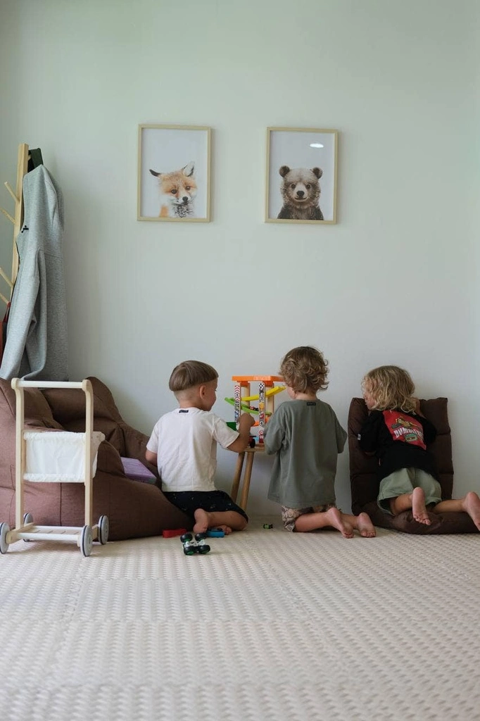 Top 10 Indoor Playgrounds in Koh Samui – Rainy Day Tips 14 A group of children playing with toys.