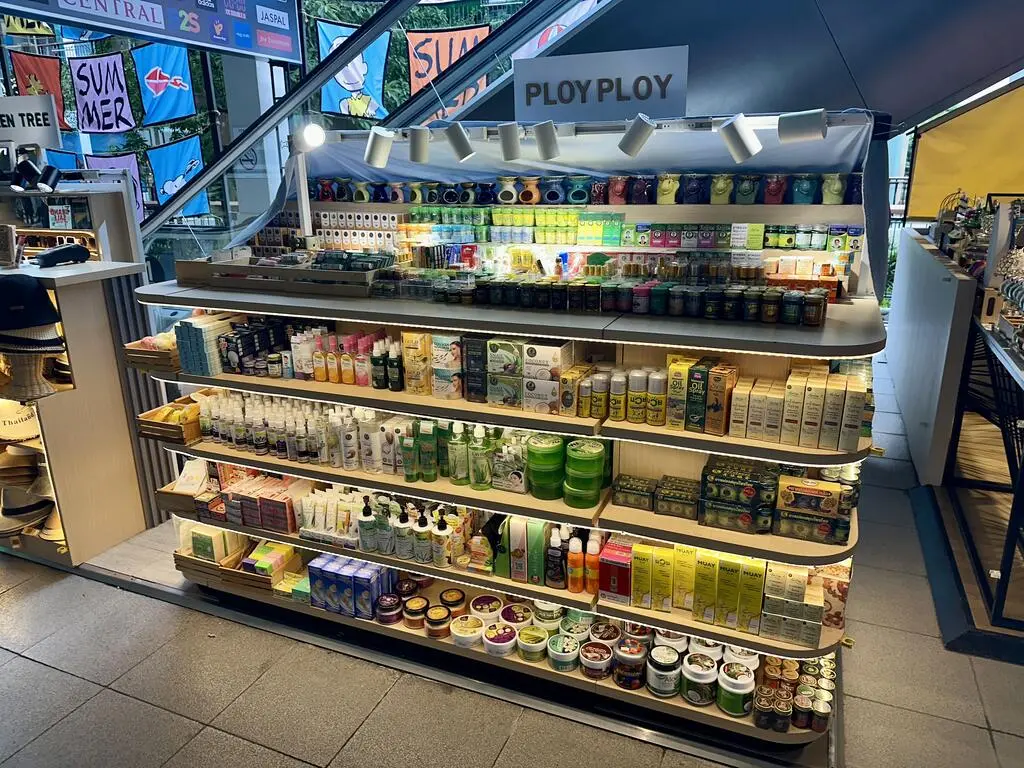 A stall in a Thai mall full of little tins and cans, oils and balms.