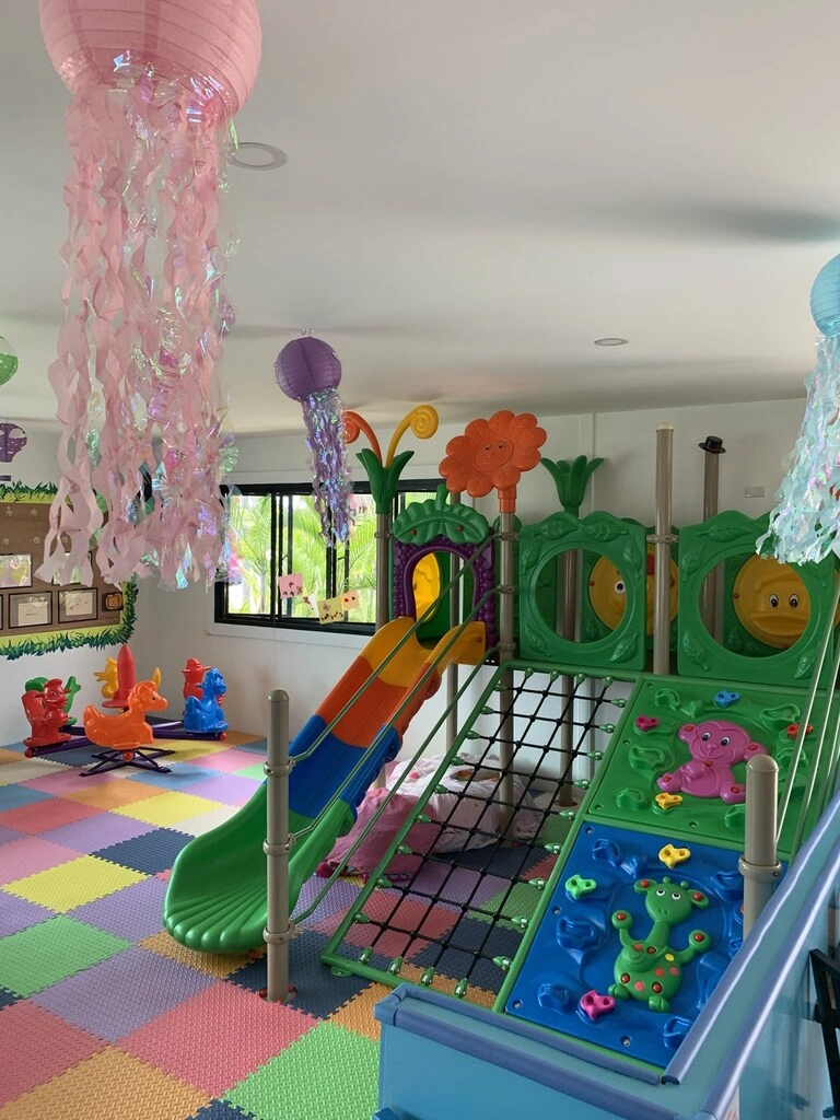 Top 10 Indoor Playgrounds in Koh Samui – Rainy Day Tips 27 A play area with colorful toys.