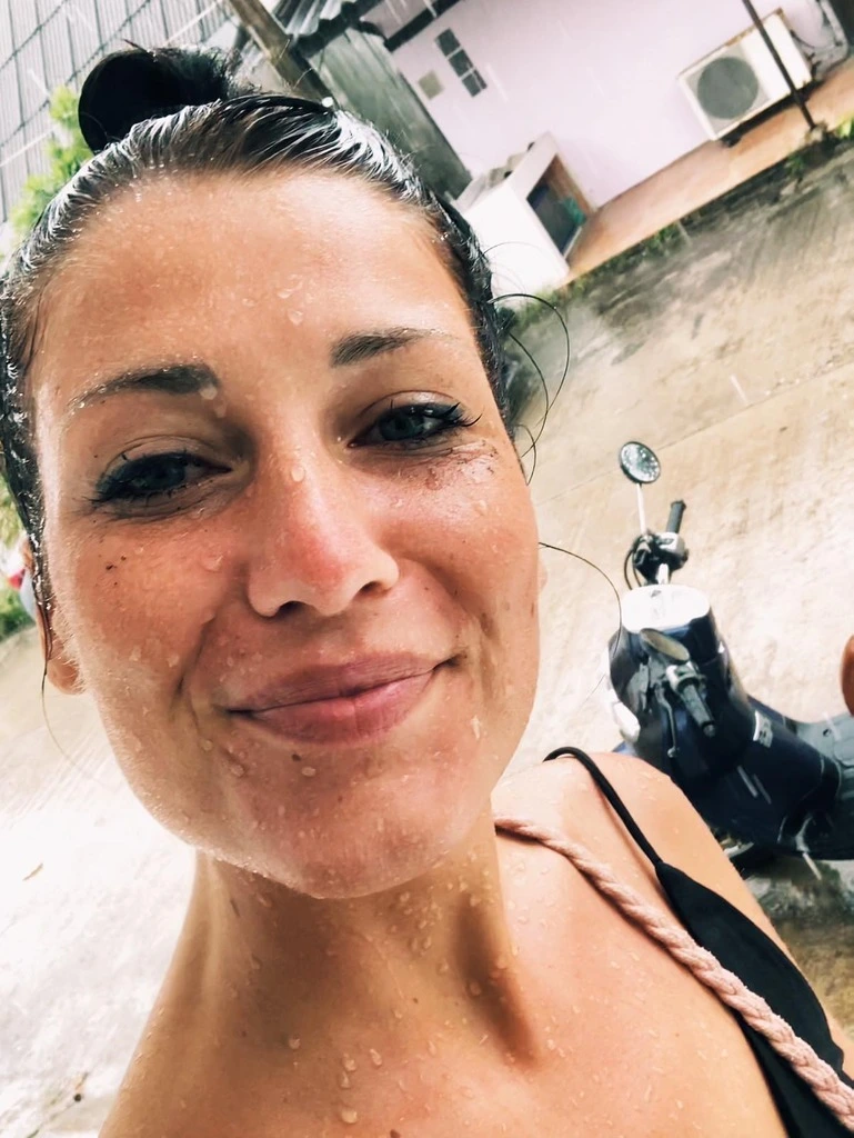 Rainy Season in Thailand – All You Need to Know 1 Woman with wet face from the rain.