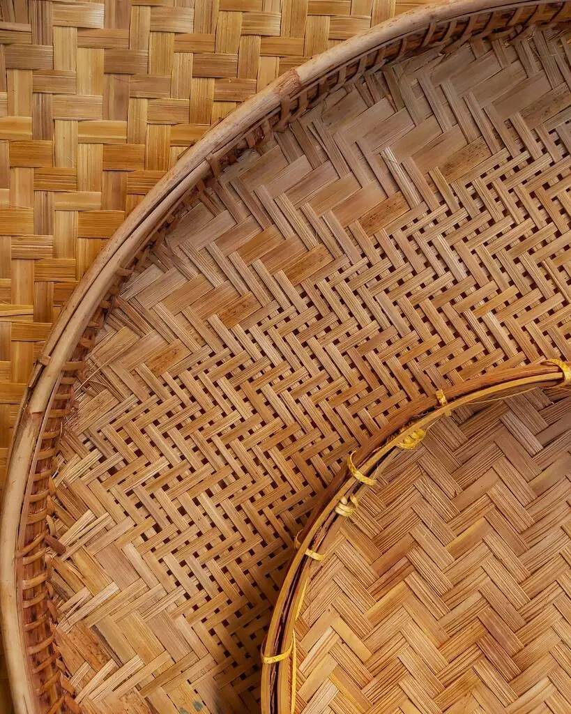 Two woven bamboo baskets.