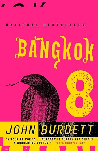A pink cover with a snake and yellow text.