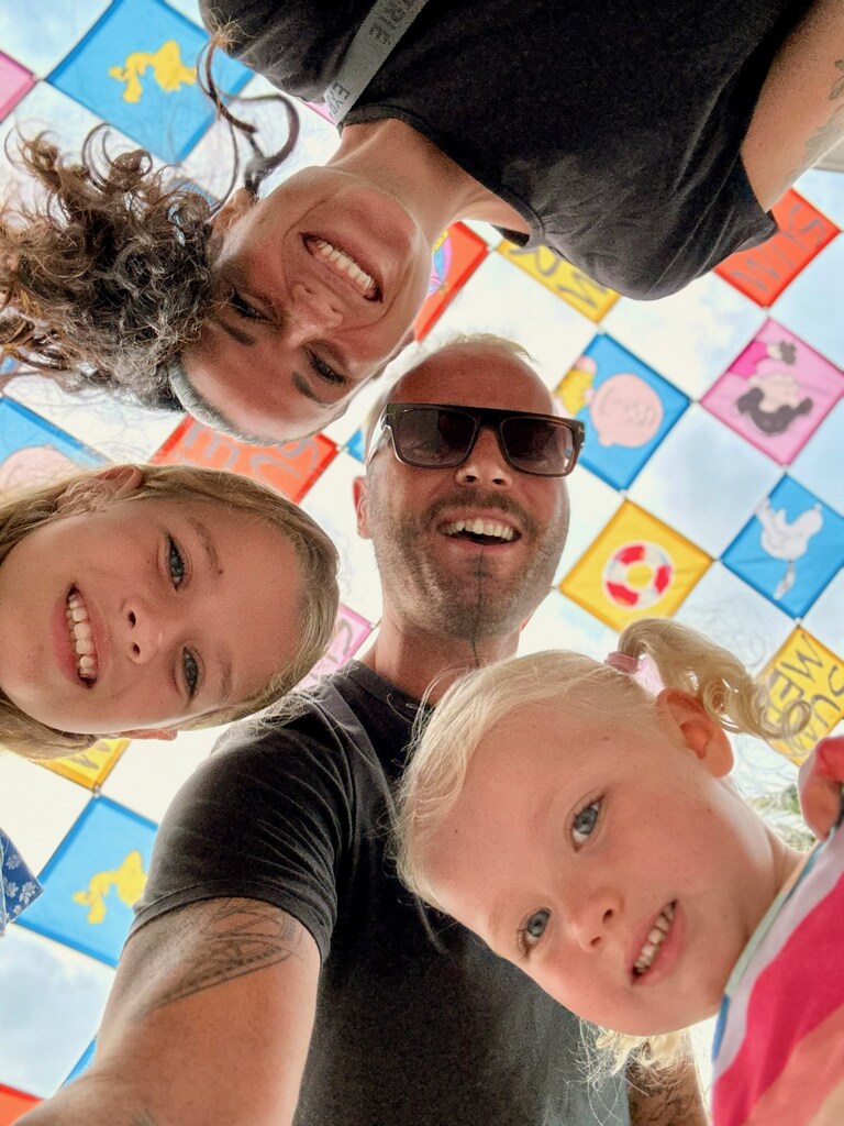 The 26 Best Family Resorts in Bali (2025 Guide with Prices) 1 A group of people posing for a picture.