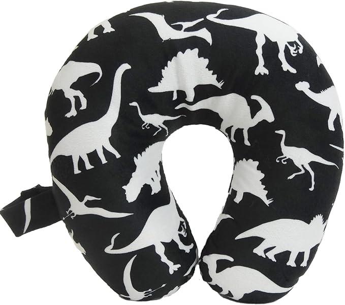 The 5 Best Travel Pillows for Kids in 2025 14 A black and white neck pillow with white dinosaurs on it.