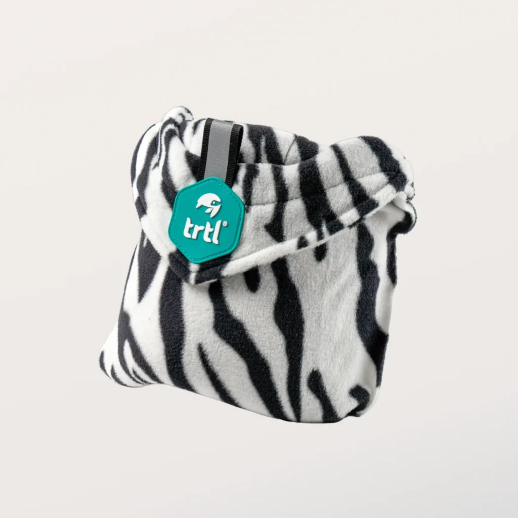 The 5 Best Travel Pillows for Kids in 2025 5 A black and white animal print fabric.