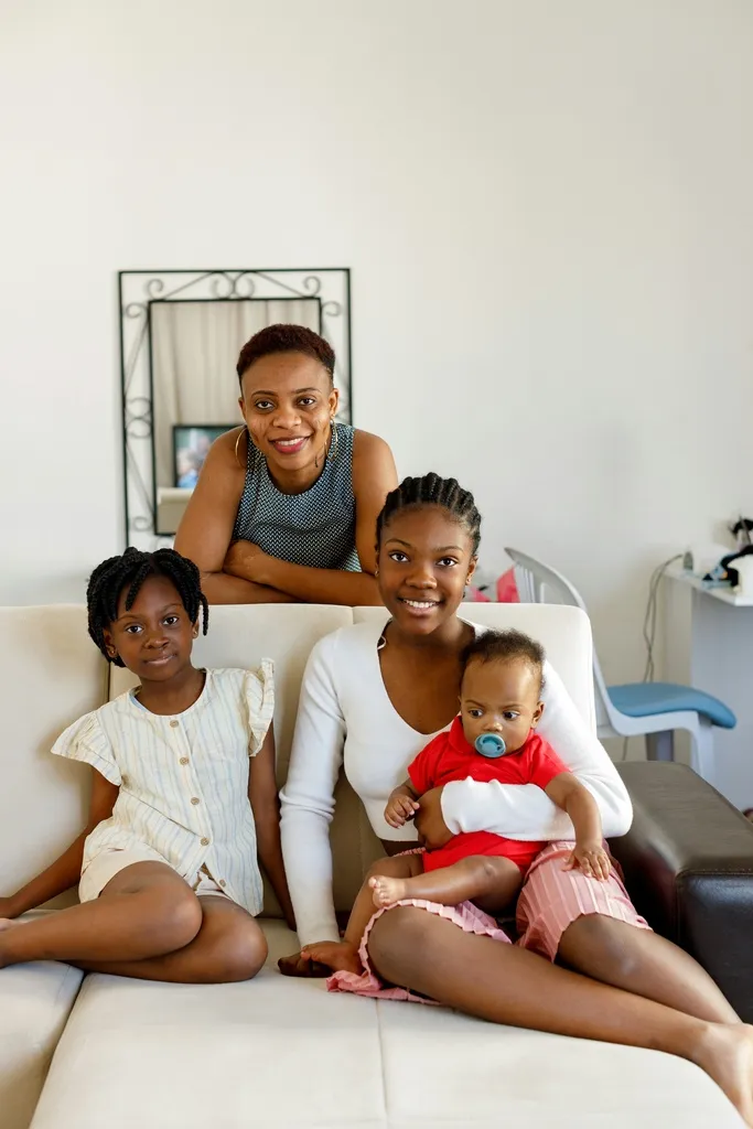 Family sitting on a sofa.