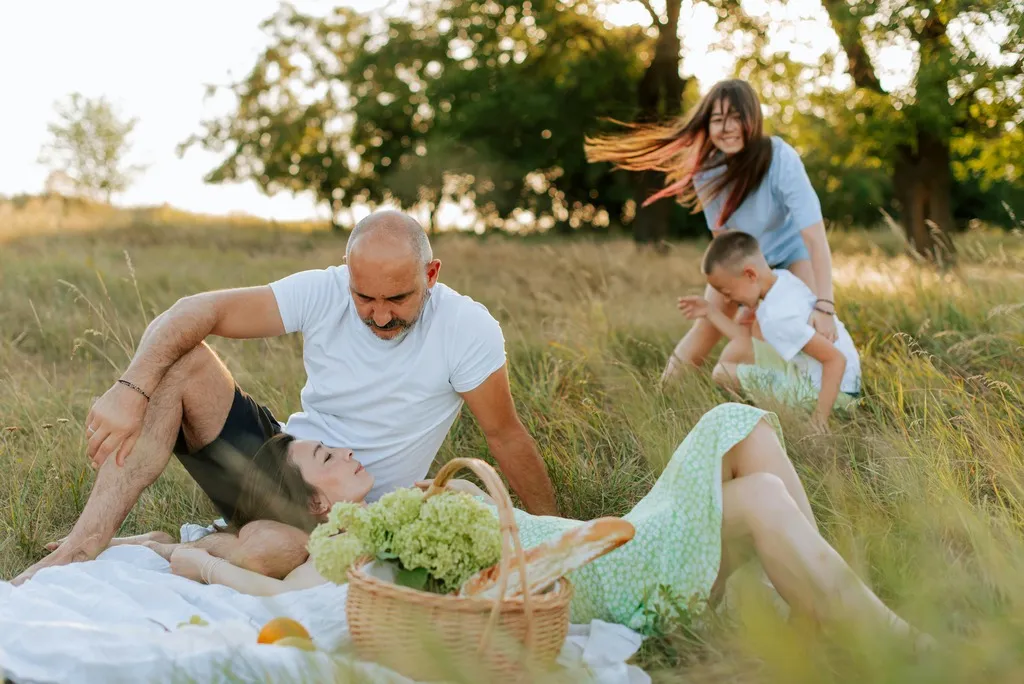 Family having a picknick in the gras.