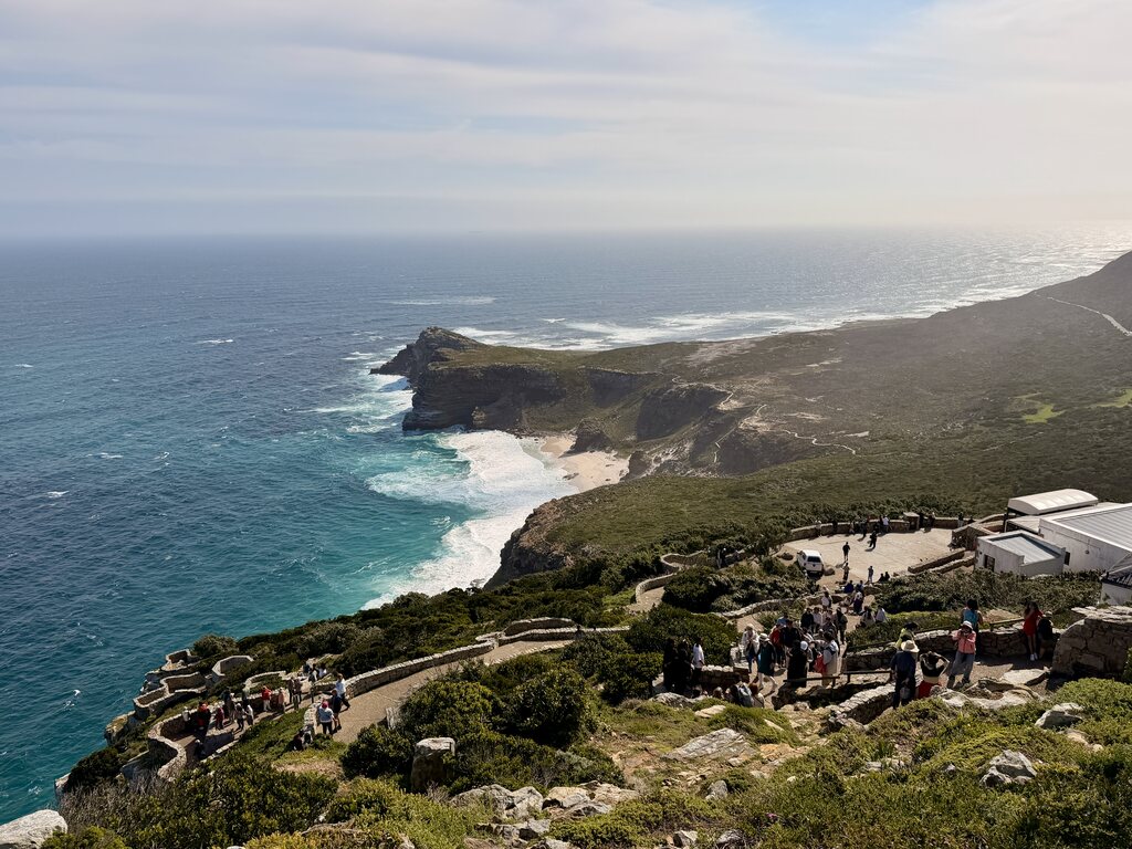 Cape of Good Hope Day Trip – Family Fun in South Africa 18 Scenic coastal view with visitors.