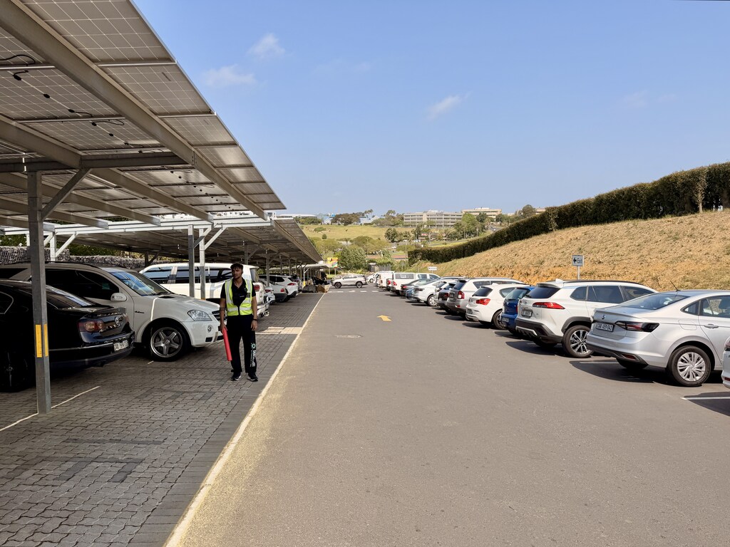 Toboggan Cape Town Fun: Our Day at Cool Runnings 3 Parking lot with solar panels overhead.