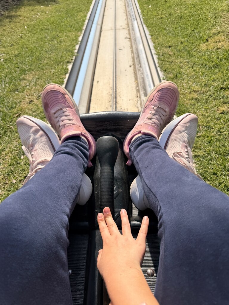 Toboggan Cape Town Fun: Our Day at Cool Runnings 12 Person's feet on a ride.