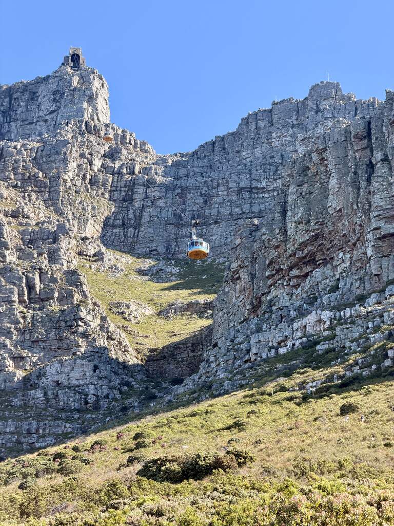 Cable Car gondola driving down a mountain. A must see in the 1 week Cape Town itinerary.