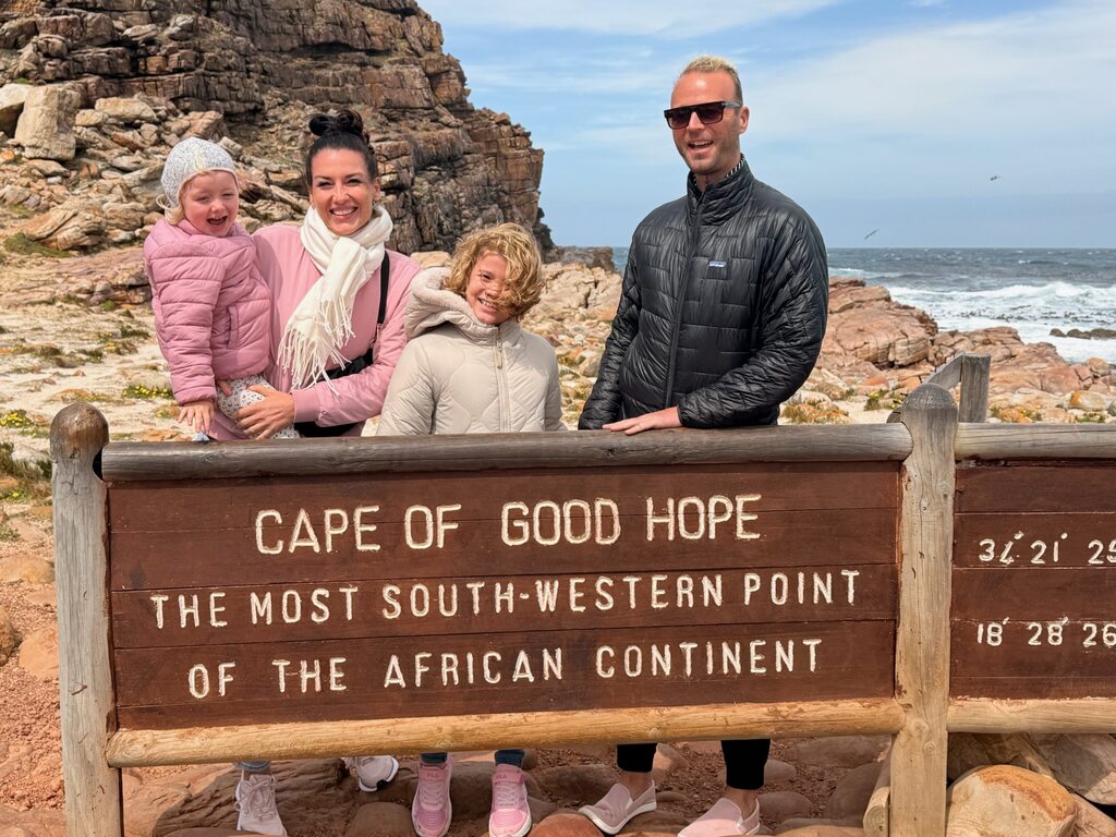 Cape of Good Hope Day Trip – Family Fun in South Africa 8 Family at the Cape of Good Hope sign.