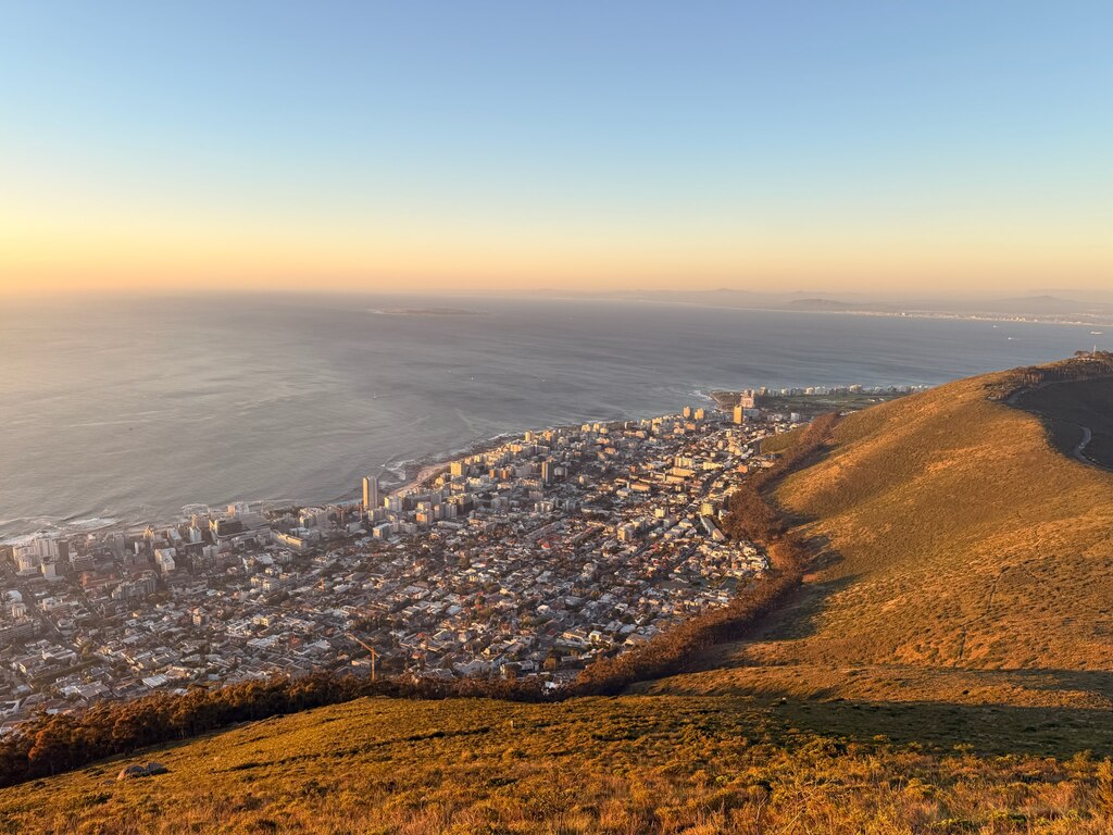 Lion's Head Hike with Kids – Is It Safe? Honest Family Guide 3 Sunset view over coastal cityscape.