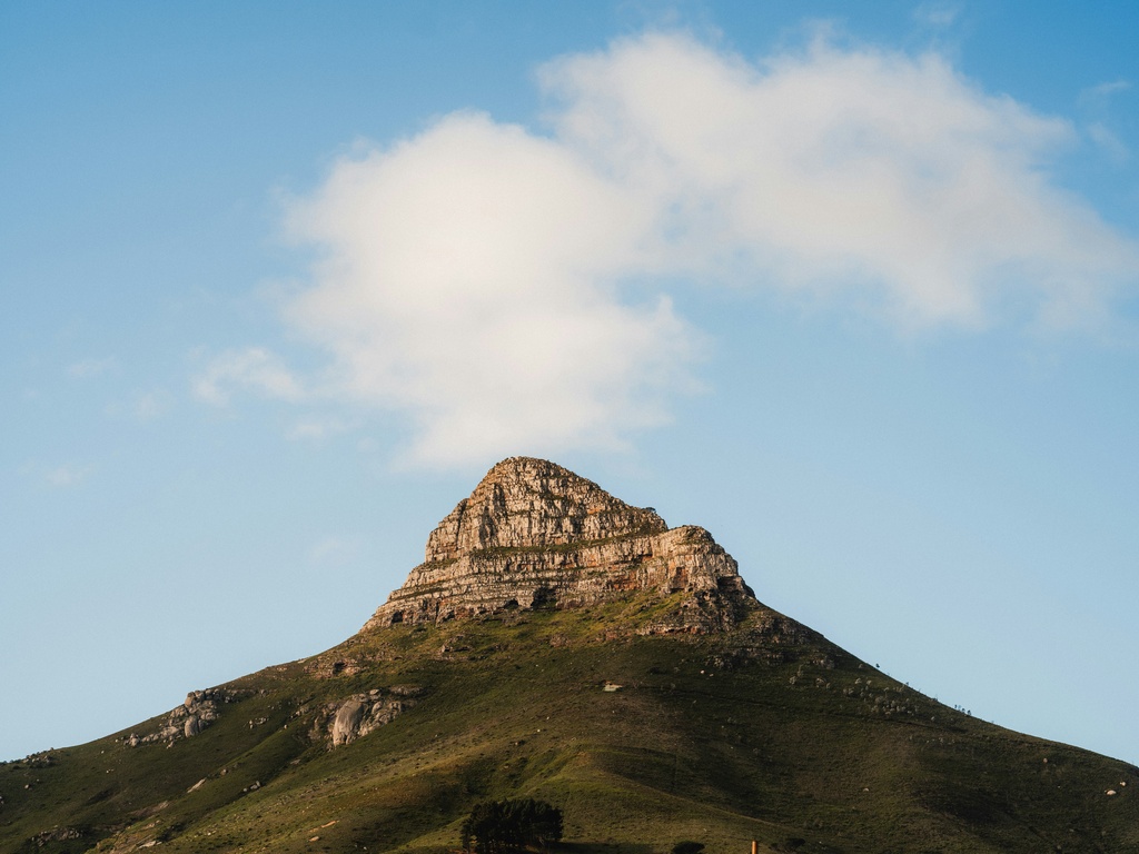 Mountain peak under a blue sky